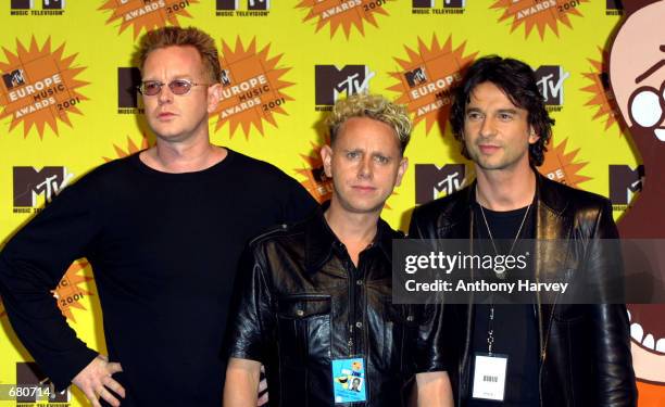 The band Depeche Mode pose backstage at the MTV European Music awards November 8, 2001 in Frankfurt, Germany.