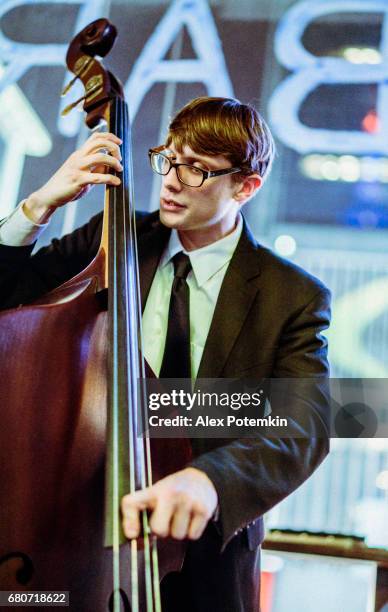 young man playing contrabasson - concert face stock pictures, royalty-free photos & images