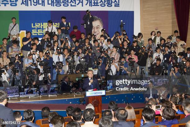 Chairman of the Democratic Party of Korea Moon Jae-in gestures during the vote counting broadcast at Korean National Assembly in Seoul, South Korea...