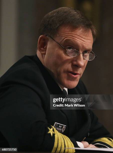 Navy Adm. Michael Rogers, commander of the U.S. Cyber Command, and Director of the National Security Agency, testifies during a Senate Armed Services...