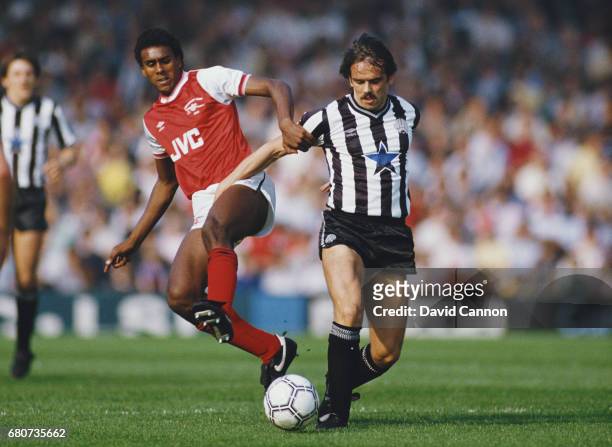 Newcastle United player Alan Davies is challenged by David Rocastle of Arsenal during a Canon League Divsiion One match at Highbury on September 28,...