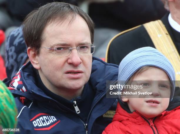 Russian Culture Minister Vladimir Medinsky and his 4-years old son attend the Victory Day military parade to celebrate the 72nd anniversary of the...