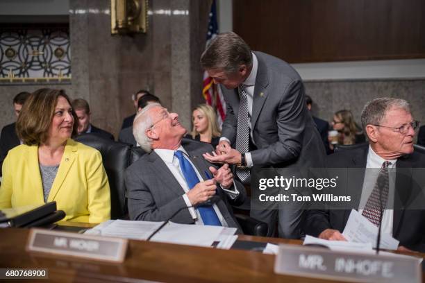 From left, Sens. Deb Fischer, R-Neb., Roger Wicker, R-Miss., David Perdue, R-Ga., and Jim Inhofe, R-Okla., attend a Senate Armed Services Committee...