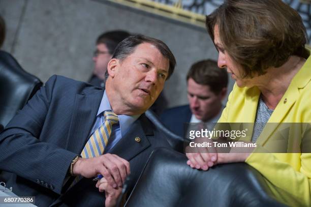 Sens. Mike Rounds, R-S.D., and Deb Fischer, R-Neb., talk before a Senate Armed Services Committee hearing in Dirksen Building titled "United States...