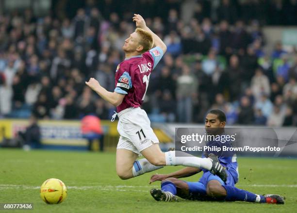 Steve Lomas of West Ham and Marvin Elliott of Millwall in action during the Coca Cola League Championship match between Millwall and West Ham United...