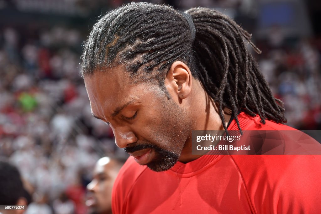 Mi Nene Rockets Nene Hilario of the Houston Rockets stands on the court before Game ...