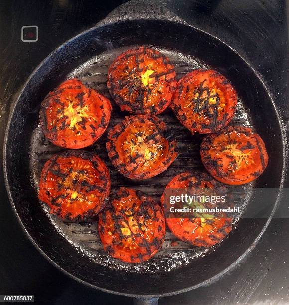 grilled tomatoes in a griddle pan - grilled tomatoes stock pictures, royalty-free photos & images