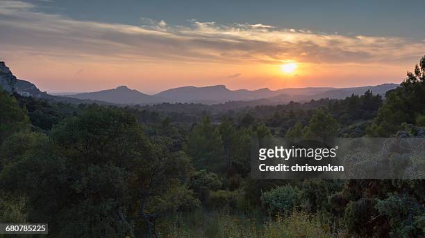 rural landscape sunset, les baux de provence, cote' d'azur, france - chrisvankan stock pictures, royalty-free photos & images
