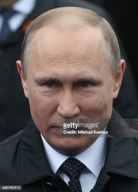 Russian President Vladimir Putin attends the Victory Day military parade to celebrate the 72nd anniversary of the victory in WWII, at Red Square on...