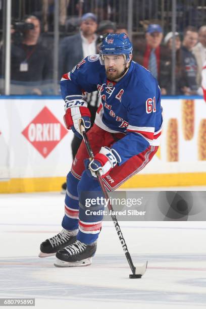 Rick Nash of the New York Rangers skates with the puck against the Ottawa Senators in Game Four of the Eastern Conference Second Round during the...