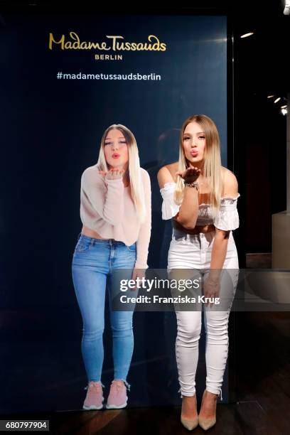 Youtube-Star Bianca 'Bibi' Heinicke poses next to a hologram of her at Madame Tussauds on May 9, 2017 in Berlin, Germany. Bibi's hologram is the...