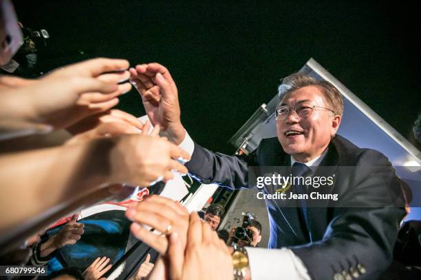 Mr. Moon Jae-in, the president-elect, greets supporters after his victory was confirmed in the presidential election on May 9, 2017 in Seoul, South...