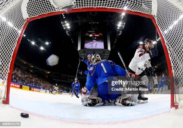 Kaspars Daugavins of Latvia celebrate the winning goal during the 2017 IIHF Ice Hockey World Championship game between Italy and Latvia at Lanxess...