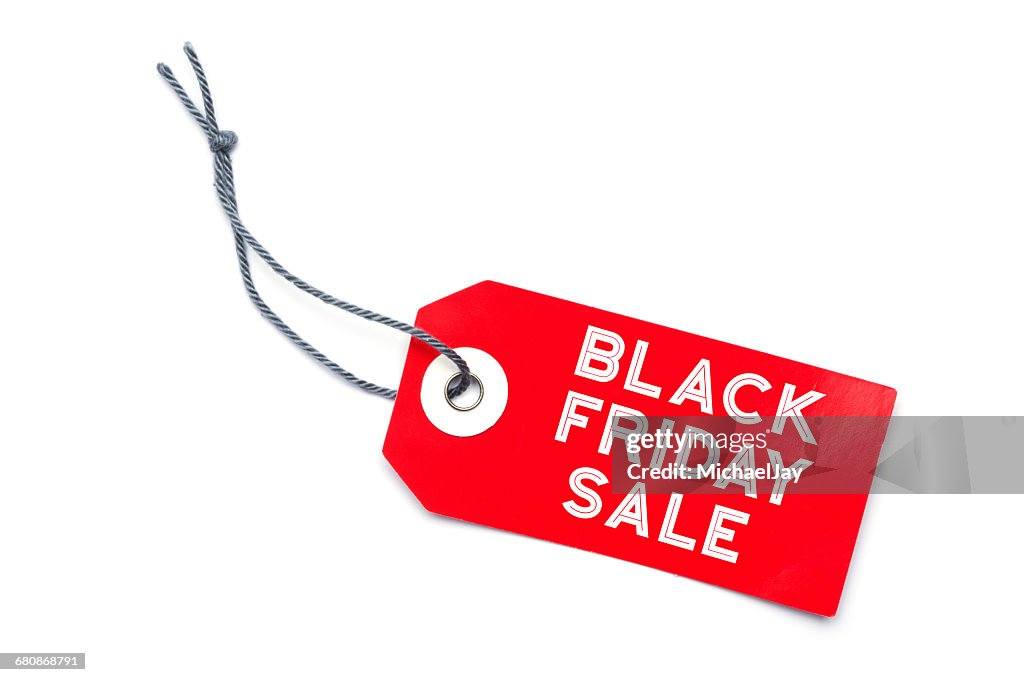 Close-Up Of Sale Tag Over White Background