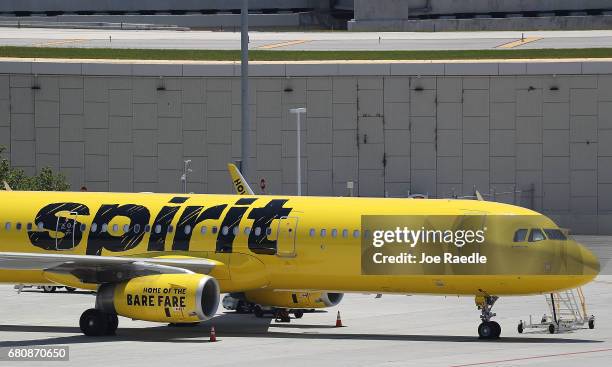 Spirit Airlines plane is seen on the tarmac at the Fort Lauderdale-Hollywood International Airport on May 9, 2017 in Fort Lauderdale, Florida....
