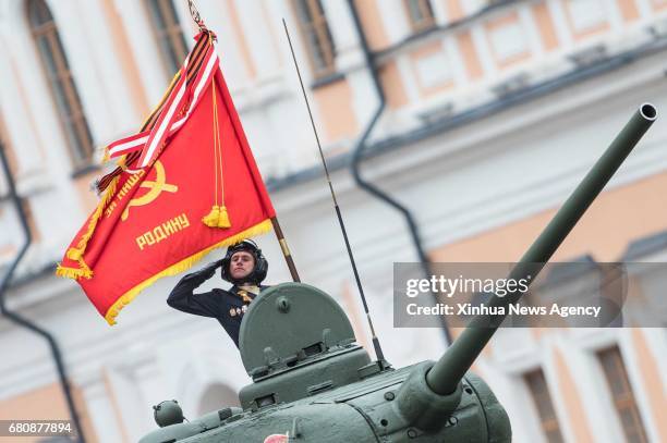 May 9, 2017 -- A soldier salutes on a tank during the Victory Day parade in Moscow, Russia, May 9, 2017. Russia marks on Tuesday the 72nd anniversary...