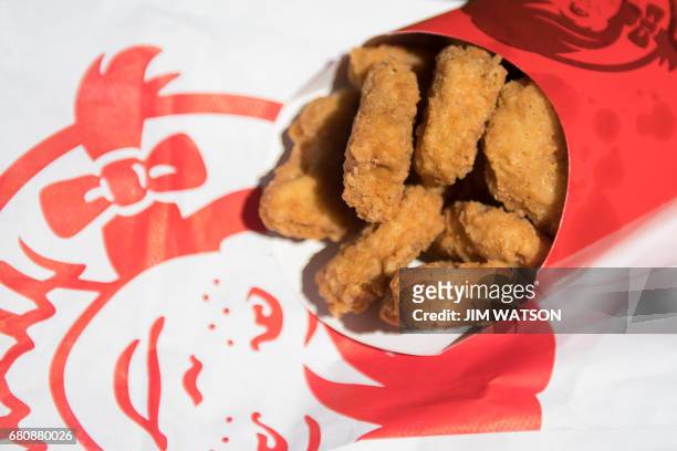 Wendy's fast food chain chicken nuggets are viewed in Bowie, Maryland on May 9, 2017. - An American teenager has broken the world record for the most...