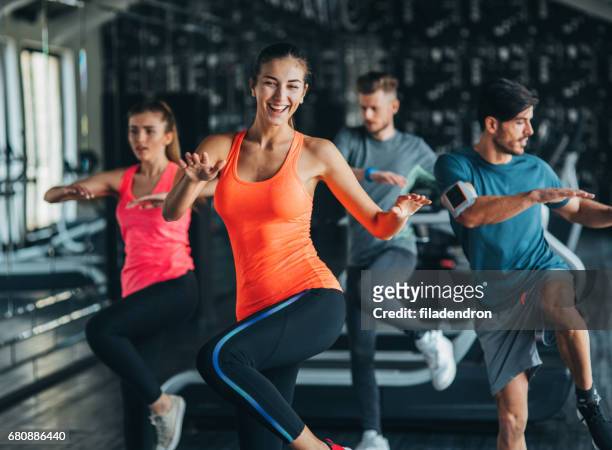exercising at the gym - zumba stock pictures, royalty-free photos & images
