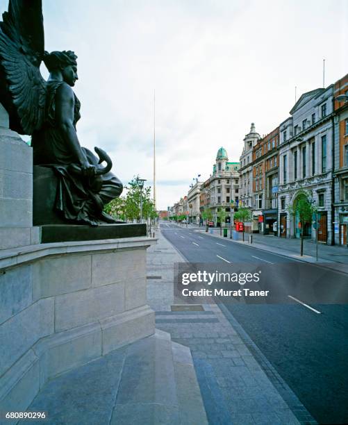 view of o'connell street and o'connell monument - o'connell street stock pictures, royalty-free photos & images