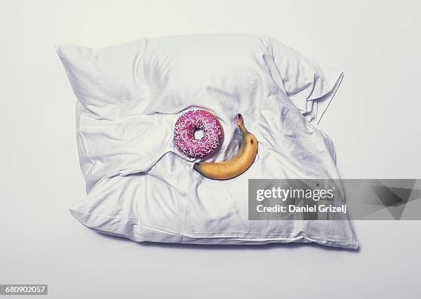 food on a pillow - desire stock pictures, royalty-free photos & images