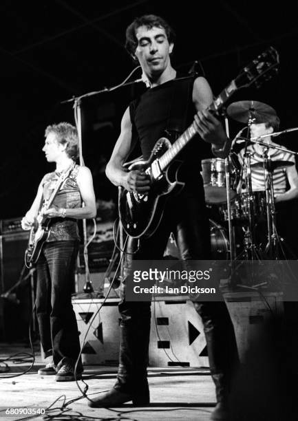 Andy Summers, Henry Padovani and Stewart Copeland of rock group The Police performing on stage at the Mont-de-Marsan Festival, 5th August 1977.