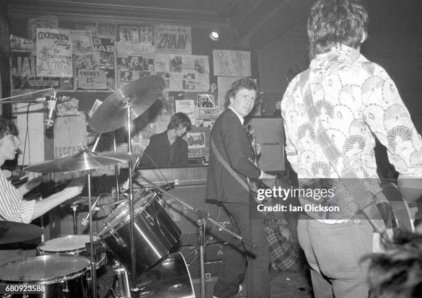 Tom Robinson Band performing on stage at The Brecknock, London, 1977.