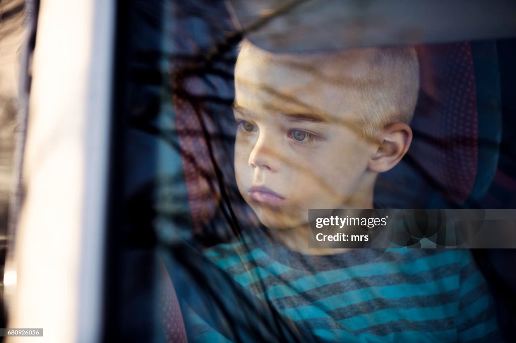 Boy in the car