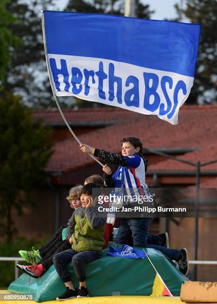 Hertha BSC fan with flag during the test match between Hertha 03 Zehlendorf and Hertha BSC U23 on may 9, 2017 in Berlin, Germany.