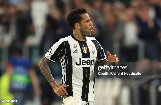 Dani Alves of Juventus celebrates scoring his sides second goal during the UEFA Champions League Semi Final second leg match between Juventus and AS...