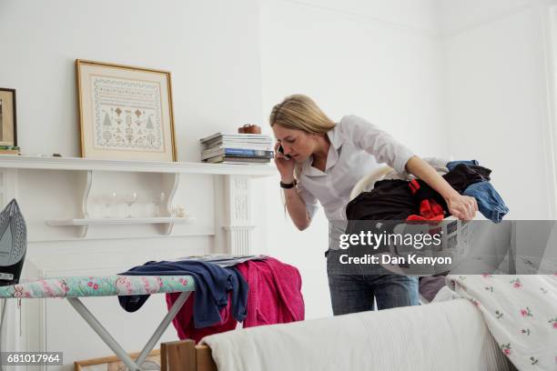 woman working at home - multitasking concept stock pictures, royalty-free photos & images