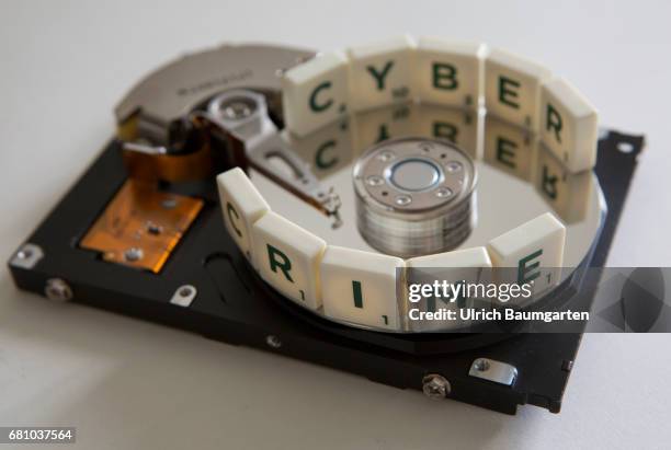 Symbol photo on the topics Cyber Crime, Computer, data security, industrial espionage, personality rights, etc. The photo shows the lettering Cyber...