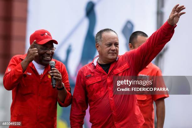 Venezuelan Minister for the Communes and Social Movements, Aristobulo Isturiz and lawmaker Diosdado Cabello join a rally of backers of Venezuelan...