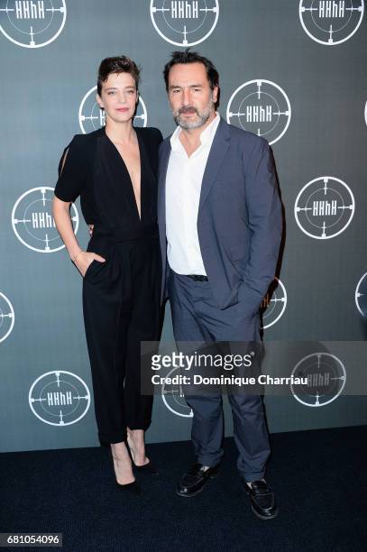 Celine Salette and Gilles Lellouche attends the "HHHH" Paris Premiere at Cinema UGC Normandie on May 9, 2017 in Paris, France.