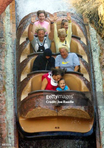 People scream as they ride on the Splash Mountain ride at Walt Disney World's Magic Kingdom November 11, 2001 in Orlando, Florida.