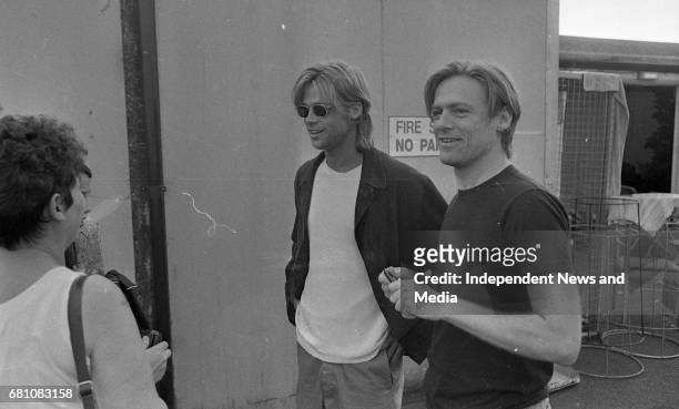 Bryan Adams and Brad Pitt sign autographs after the Concert at The Point Depot, Dublin, .