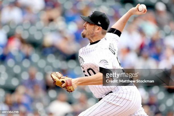 Chad Qualls of the Colorado Rockies throws in the ninth inning against the Chicago Cubs at Coors Field on May 9, 2017 in Denver, Colorado.