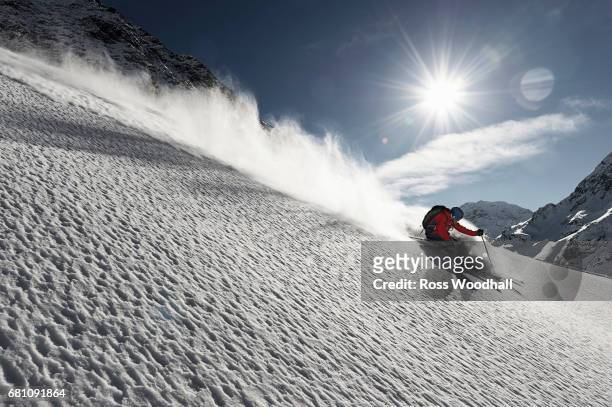 male skier turning off piste - kuehtai foto e immagini stock