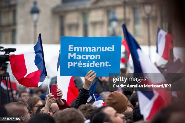 Supporters celebrate victory of Emmanuel Macron , Founder and Leader of the political movement 'En Marche !' and elected as new French President at...