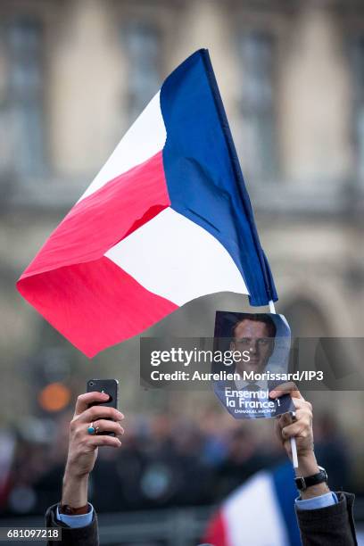 Supporters celebrate victory of Emmanuel Macron , Founder and Leader of the political movement 'En Marche !' and elected as new French President at...