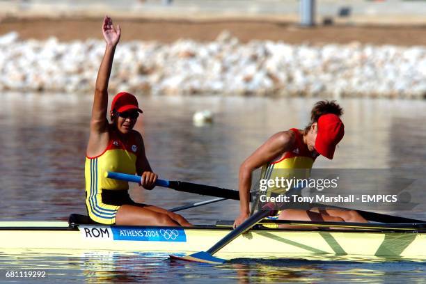 Romania's Georgeta Damian and Viorica celebrate winning gold