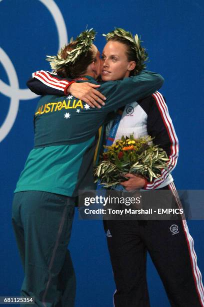 Australia's Leisel Jones and USA's Amanda Beard congratulate eachother after receiving their medals