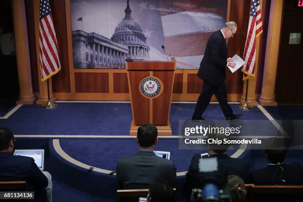 Senate Minority Leader Chuck Schumer leaves the podium after a news conference at the U.S. Capitol following the firing of Federal Bureau of...