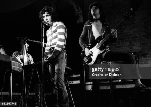 Alex Harvey and Chris Glen of The Sensational Alex Harvey Band performing on stage at Reading, Festival, Reading, United Kingdom, 23 August 1974.