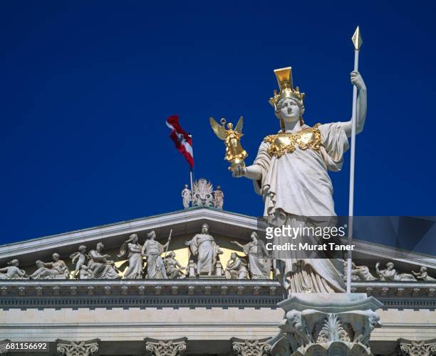 pallas athena statue in front of the austrian parliament - austria flag stock pictures, royalty-free photos & images