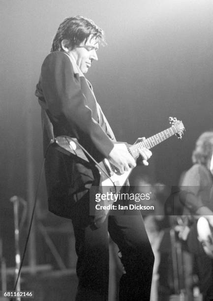 Chris Spedding performing on stage at Lyceum Theatre, London, 04 November 1977.