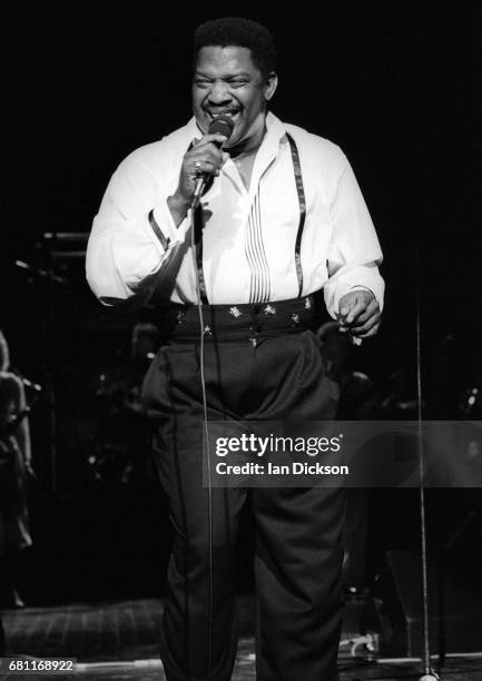 Edwin Starr performing on stage at Magic Of Motown Revue, Hammersmith Odeon, London, 24 October 1989.