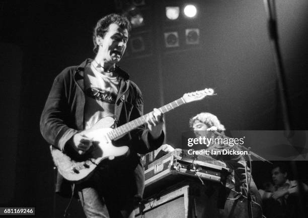 Hugh Cornwell and Dave Greenfield of The Stranglers performing on stage at The Roundhouse, Chalk Farm, London, 04 July 1976.