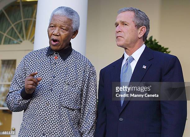 President George W. Bush and former South African president Nelson Mandela offer their condolences to the relatives of the victims of American...