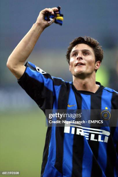 Inter Milan's Javier Zanetti celebrates with the fans at the end of the game