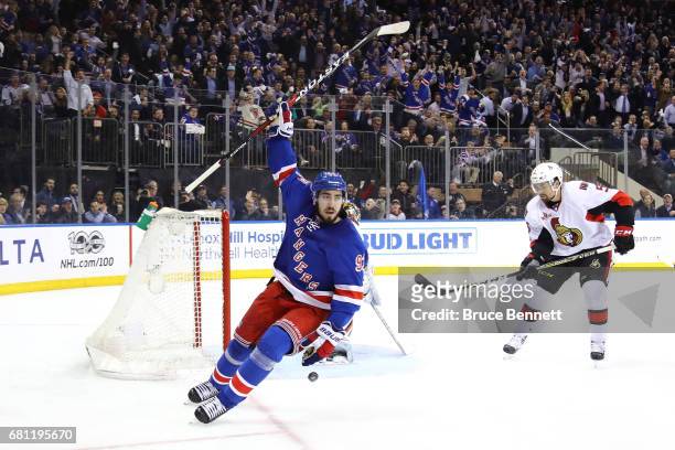 Mika Zibanejad of the New York Rangers celebrates after scoring a goal against Craig Anderson of the Ottawa Senators during the second period in Game...